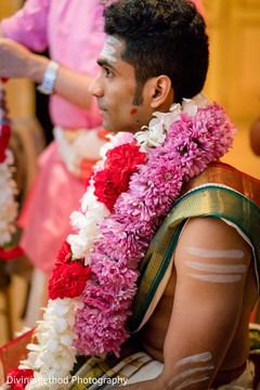 Raja wearing the flower garland Raja wearing the flower garland
