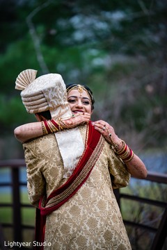 Indian bride and groom hugging Indian bride and groom hugging