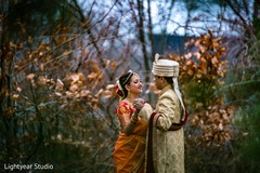 Indian couple posing for pictures Indian couple posing for pictures