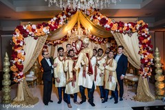 Indian groom being lifted by groomsmen Indian groom being lifted by groomsmen
