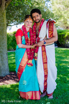 Indian couple posing during photo shoot Indian couple posing during photo shoot