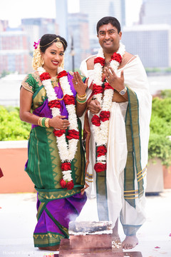 Indian bride and groom showing their rings Indian bride and groom showing their rings