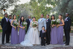 Maharani and rajah posing with bridesmaids and groomsmen. Maharani and rajah posing with bridesmaids and groomsmen.