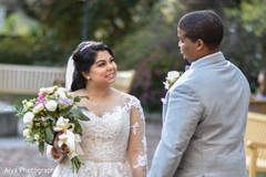 Indian couple on their Christian wedding outfits. Indian couple on their Christian wedding outfits.