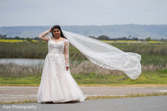Cute indian bride outdoors capture. Cute indian bride outdoors capture.