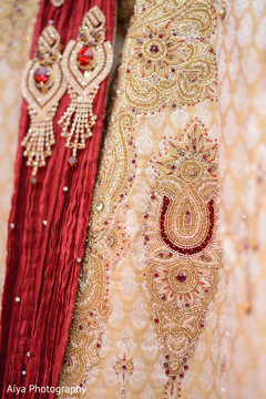 Incredible Indian groom's embroidery on ceremony sherwani. Incredible Indian groom's embroidery on ceremony sherwani.