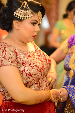 See this lovely Indian bride getting ready. See this lovely Indian bride getting ready.
