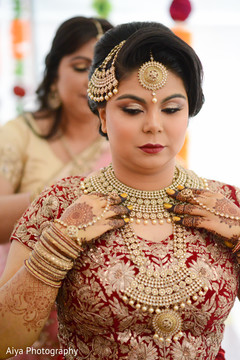 Maharani getting her ceremony jewelry on. Maharani getting her ceremony jewelry on.