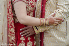 Closeup capture of Indian bride and groom's hands. Closeup capture of Indian bride and groom's hands.