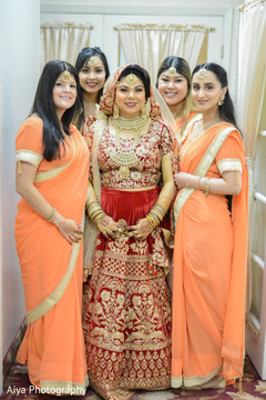 Lovely Indian bride with bridesmaids capture. Lovely Indian bride with bridesmaids capture.