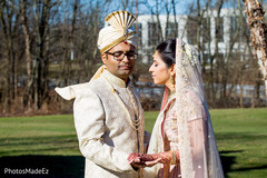 Indian bride and groom having a romantic moment Indian bride and groom having a romantic moment