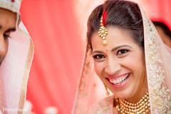 Indian bride looking at the camera Indian bride looking at the camera