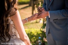 Indian bride getting ring from groom capture. Indian bride getting ring from groom capture.