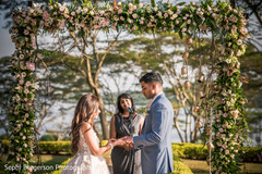 Indian bride putting ring to groom capture. Indian bride putting ring to groom capture.