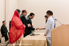 Indian bride getting her wedding ring capture. Indian bride getting her wedding ring capture.