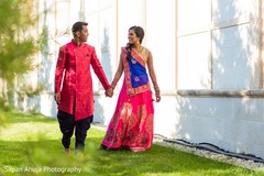 Lovely Indian bride and groom holding hands. Lovely Indian bride and groom holding hands.