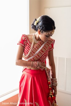Indian bride putting her sari on. Indian bride putting her sari on.