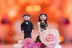 Incredible Indian wedding cake topper decor. Incredible Indian wedding cake topper decor.