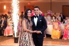 Joyful indian couple showing some dance moves. Joyful indian couple showing some dance moves.
