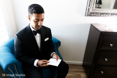Indian groom reading bride's letter. Indian groom reading bride's letter.