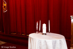 Special Indian Christian wedding ceremony candles capture.