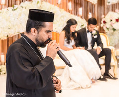 Indian wedding priest making a prayer. Indian wedding priest making a prayer.