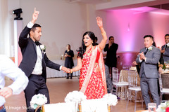 Indian couple making their entrance to reception. Indian couple making their entrance to reception.