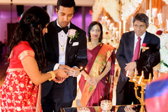 Indian couple lighting up the fire. Indian couple lighting up the fire.