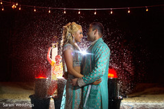 Indian bride and groom having a romantic moment Indian bride and groom having a romantic moment