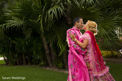 Indian bride and groom having a romantic moment Indian bride and groom having a romantic moment