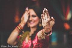 Indian bride posing with her mehdni Indian bride posing with her mehdni