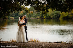Enchanting capture of the couple by the lake Enchanting capture of the couple by the lake