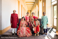 Adorable Indian lovebirds posing with parents. Adorable Indian lovebirds posing with parents.