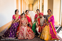 Indian couple posing with relatives capture. Indian couple posing with relatives capture.