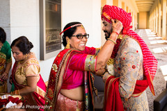 Indian groom getting his turban fixed. Indian groom getting his turban fixed.