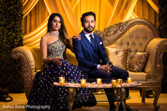 Joyful Indian bride and groom on their reception outfits. Joyful Indian bride and groom on their reception outfits.