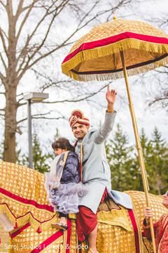 Indian groom riding the horse Indian groom riding the horse