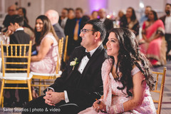 Indian couple reacting to guests Indian couple reacting to guests