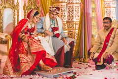 Indian bride and groom during the rituals Indian bride and groom during the rituals