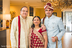 Indian groom with his parents Indian groom with his parents