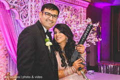 Indian couple having a great time at the reception Indian couple having a great time at the reception