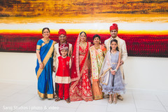 Indian bride posing with special family members Indian bride posing with special family members