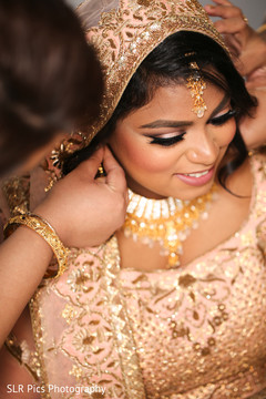 Bride being assisted by special guest Bride being assisted by special guest