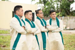 Groomsmen posing for pictures Groomsmen posing for pictures