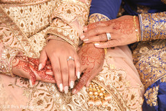 Bride and groom showing their rings Bride and groom showing their rings