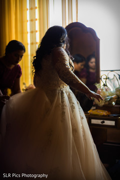 Indian bride wearing the gown Indian bride wearing the gown