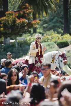 Indian groom with guests at the baraat Indian groom with guests at the baraat