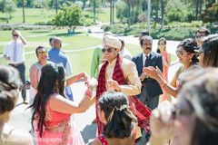 Indian groom having a great time with guests Indian groom having a great time with guests