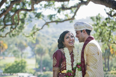 Indian bride and groom posing for pictures Indian bride and groom posing for pictures