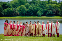 Indian couple posing with bridesmaids and groomsmen. Indian couple posing with bridesmaids and groomsmen.